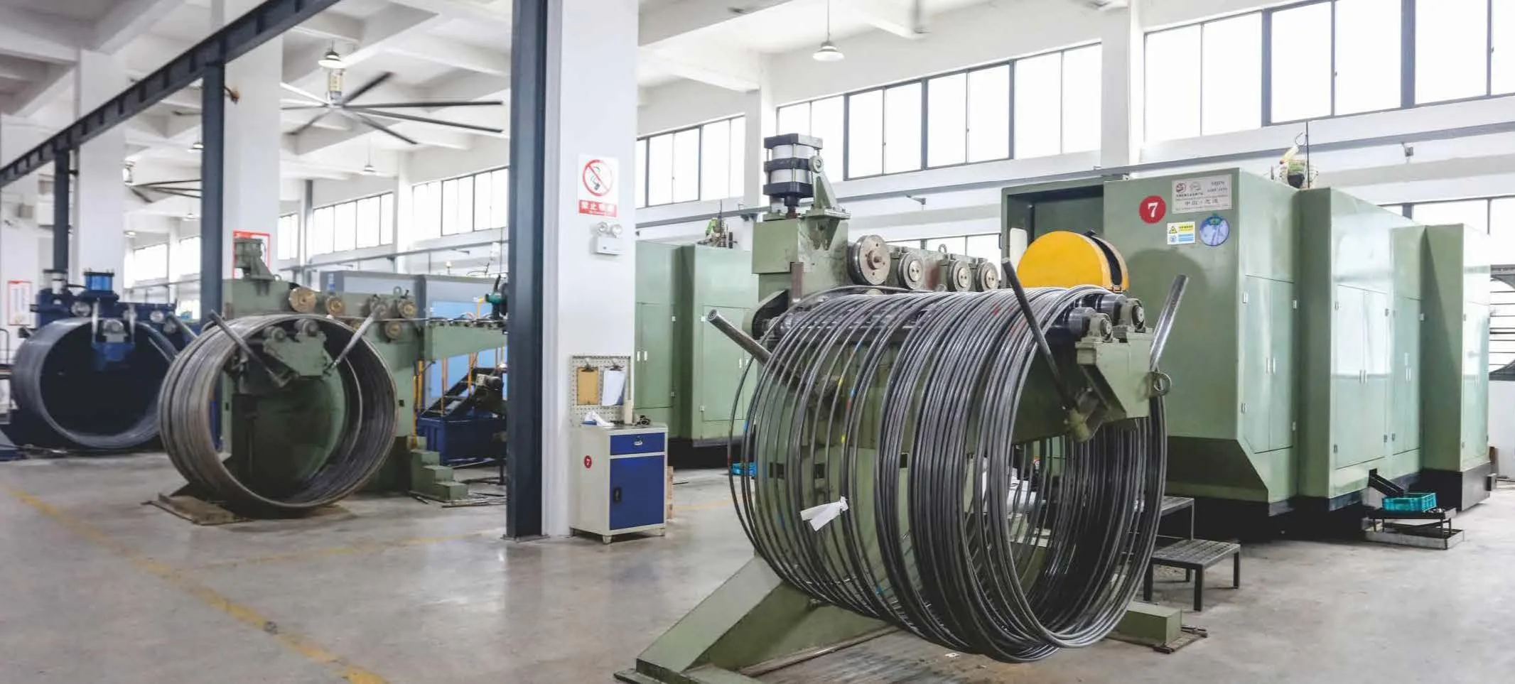 Cold forging workshop with precision cold heading machines and automated systems